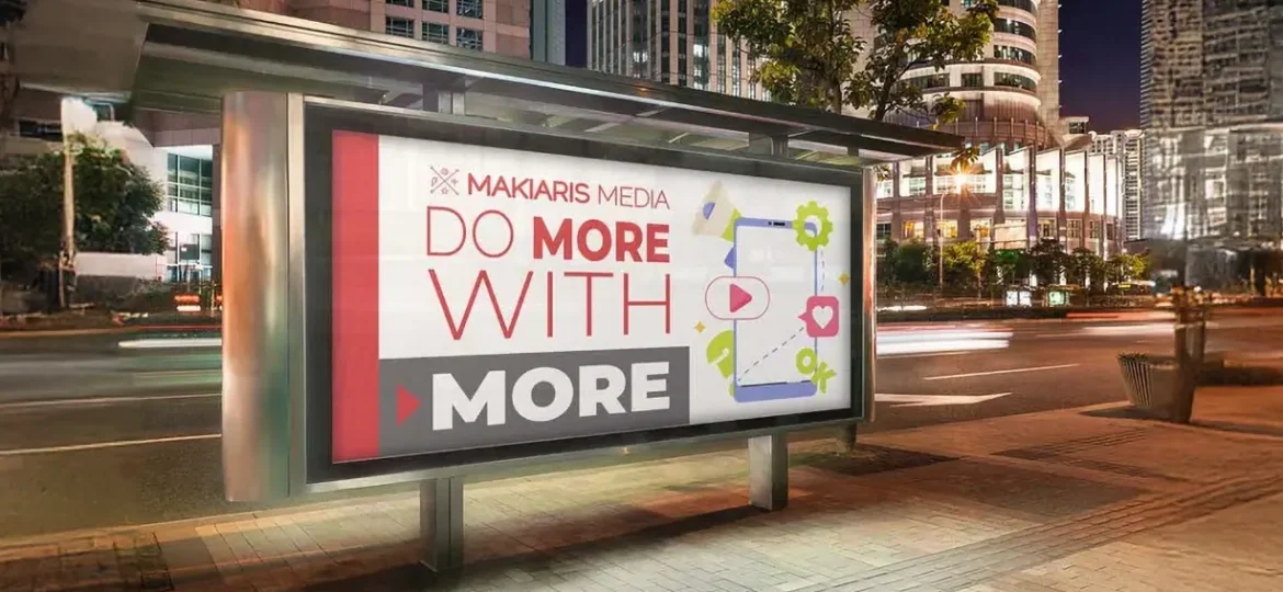 Makiaris Media outdoor advertisement at a bus stop with the slogan 'Do More With More,' highlighting media and digital marketing services with icons representing social media, analytics, and engagement.